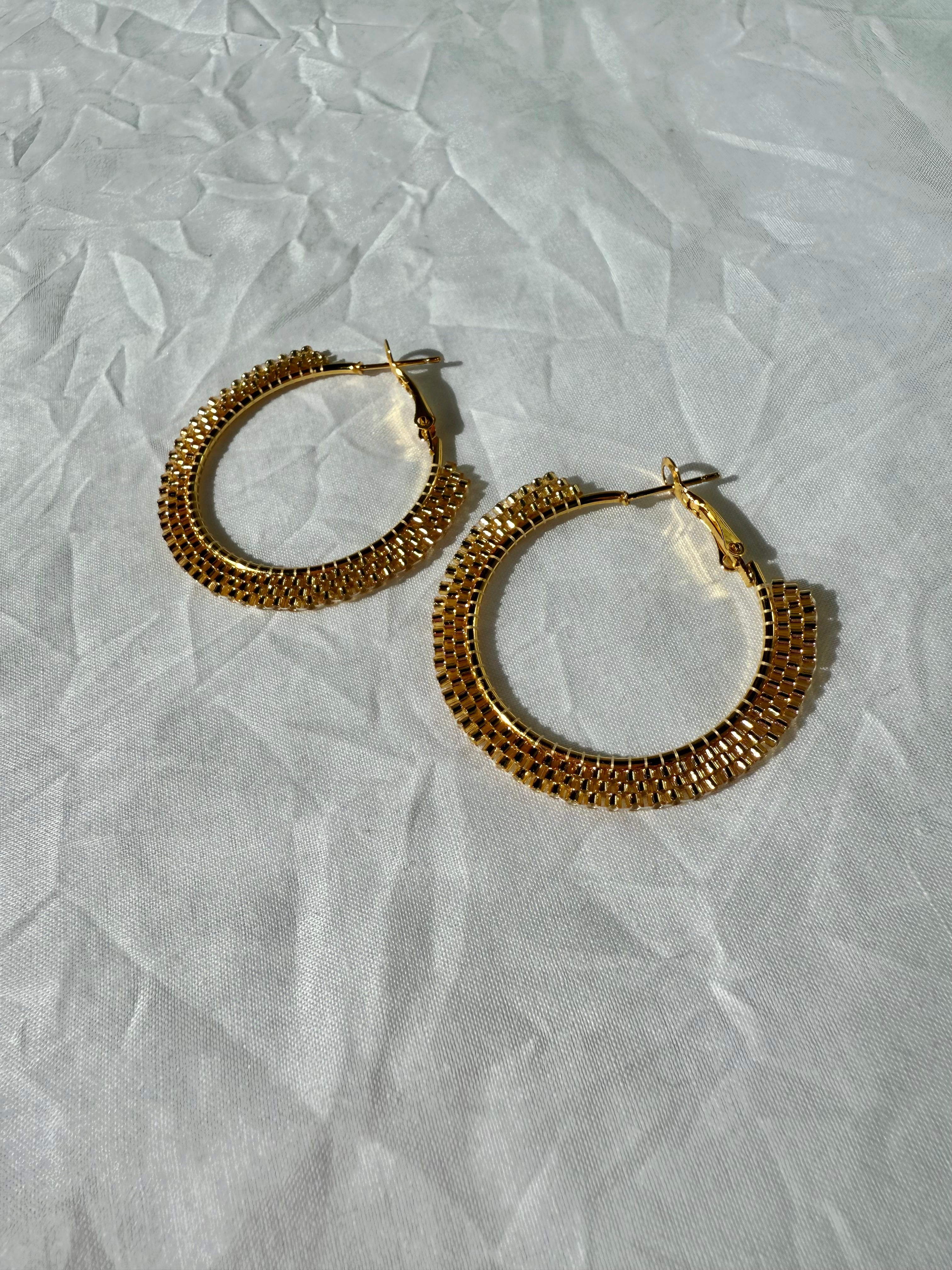 The Infinite Loop Of $$$ Hoop Earrings