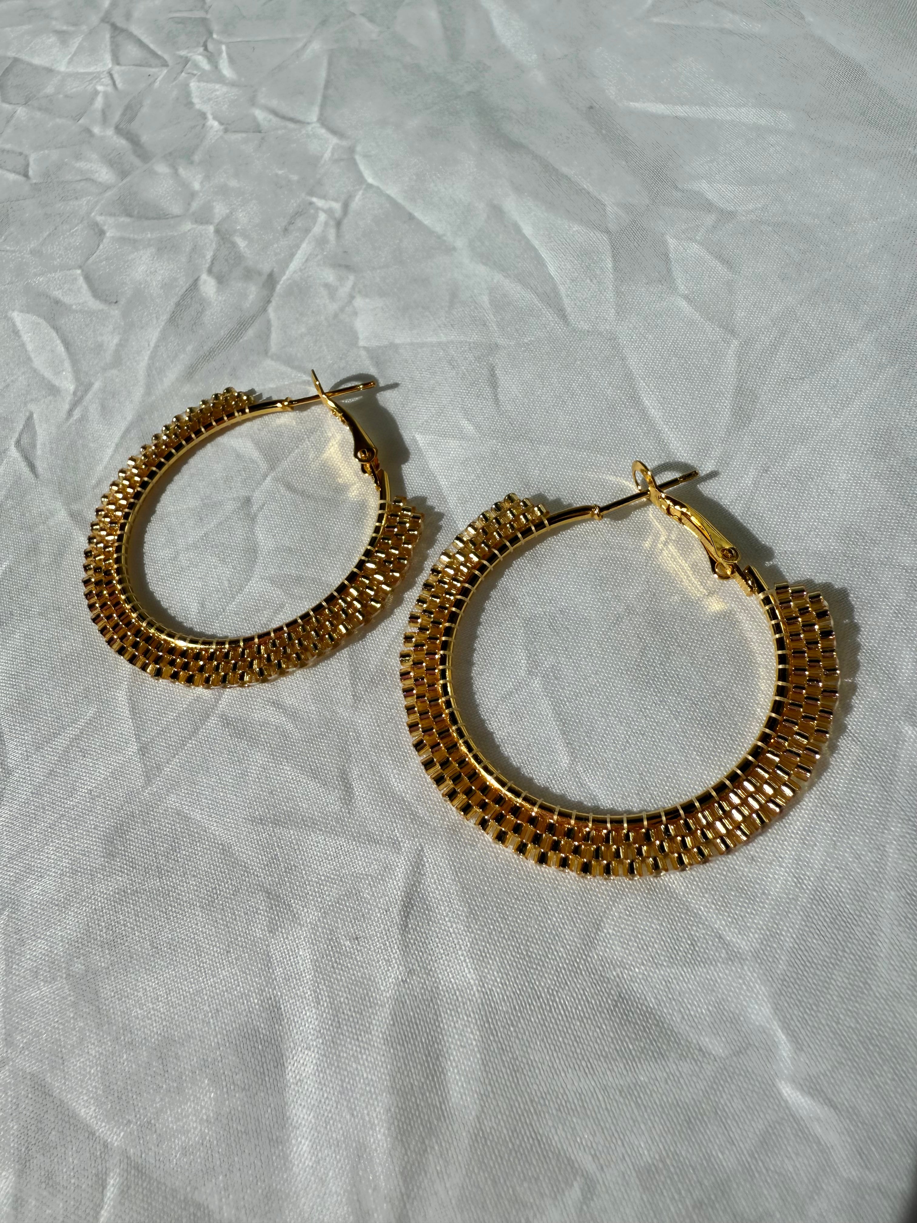 The Infinite Loop Of $$$ Hoop Earrings