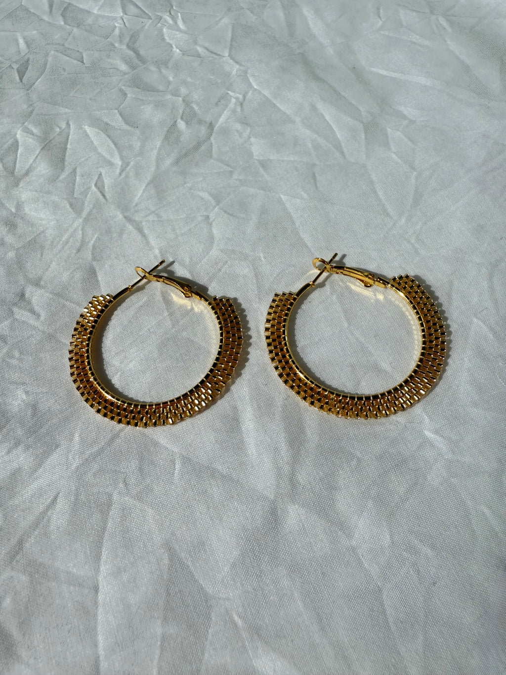 The Infinite Loop Of $$$ Hoop Earrings